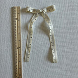 Cream ruler Bow