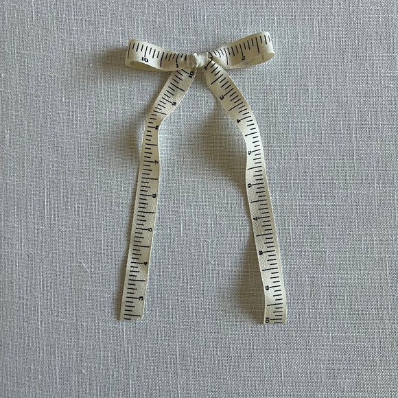 Cream ruler Bow